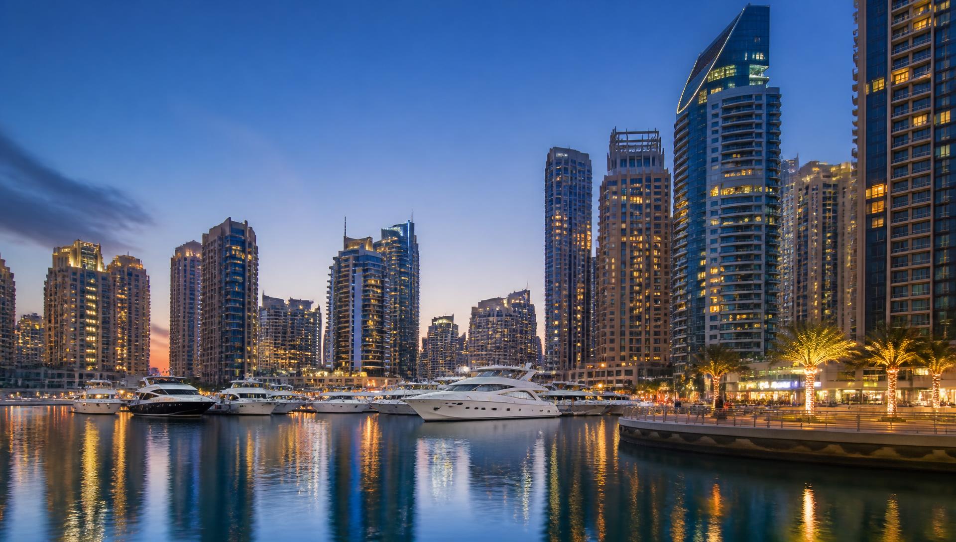 Dubai Marina waterfront and yachts at dusk